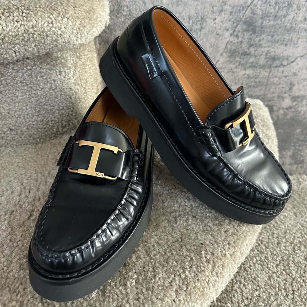 Tod’s Black Leather Loafers with Gold Timeless T